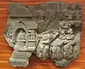 Adoration d'un stupa dans un vihara. Fragment de relief, « style graphique ». Schiste vert. Butkara I. Milieu du Ier&nbsp;siècle. Museo nazionale d'arte orientale MNAO, Rome