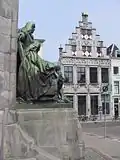 La statue des frères de Witt (Johan et Cornelius) et la bibliothèque.