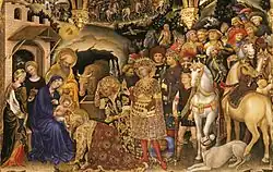Les rois mages s'inclinant devant Jésus et suivi d'un cortège