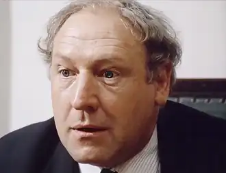 Georges Wilson(Agent de police)