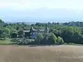 Maison de Coulom, vue de la halle, avec la chaîne des Pyrénées.