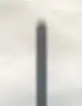 Ombre et pénombre à l'extrémité d'un gnomon cylindrique.