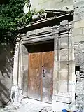 Bas-côté sud, portail début du XVIIe s.