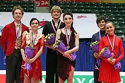 Podium de la finale du Grand Prix ISU 2010/2011 avec Meryl Davis / Charlie White et Vanessa Crone / Paul Poirier