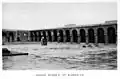 Vue partielle de la cour et de son portique oriental, photographie extraite d'un ouvrage datant de 1918.