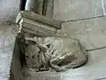 Cul-de-lampe mutilé.