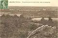 Guer ː vue générale du bourg depuis la butte du Dran (carte postale).