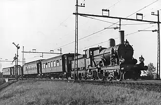 La 1718 remorquant en 1947 le dernier train à vapeur sur la ligne 'Hofplein' (Rotterdam-La Haye).