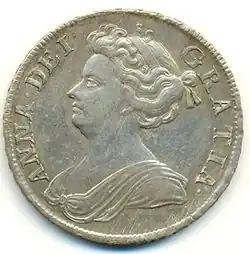 Une pièce de monnaie portant le profil d'une femme corpulente entouré d'une légende en latin