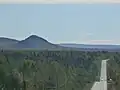 Vers le canton de Hampden par la route 214, à gauche le Pain de Sucre.