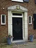 Haps, blason au-dessus de la porte de l'ancienne maison du maire