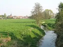 Village et la Trouille vus depuis le pont de la route d'Harveng.