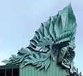 Acrotère sur l'angle nord-ouest.