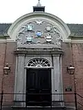 L'entrée de la Cour des femmes de Madame van Aerden.