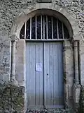 porte plein-cintre à un seul simple rouleau