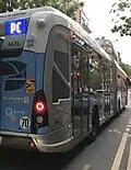 Bus Heuliez GX 437 Hybride sur la ligne PC.