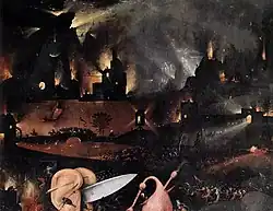 Une ville en flammes dans la nuit
