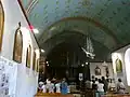 L'église Notre-Dame-la-Blanche, nef et ex-votos.