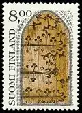La porte en fer forgé sur un timbre postal de 1983.
