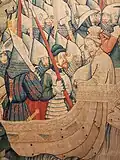 Hommes d'armes en harnois des années 1380 sur une nef de guerre. Tapisserie du cycle de Jourdain de Blaye (musée archéologique de Padoue).