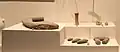 Divers outils de pierre polie : Meule, haches... Culture de Houli. Musée Provincial du Shandong