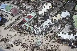 Dégâts à Philipsburg et arrivée du chaland Pelikaan le 8 septembre.