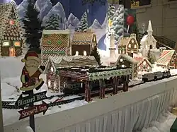 Avec trains en modèle réduit.