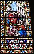 Vitrail de saint Roch guérissant les malades.