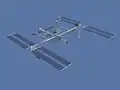 Image de synthèse de l'ISS après STS-118 (août 2007) : ajout de l'élément S5 (petite partie tout à l'extrémité de l'élément S3/S4, en bas à gauche, entre les panneaux solaires).