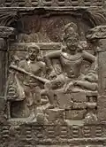 1B: Sibi Jataka . Le roi Sibi donne une partie de sa propre chair aux blessés.