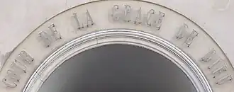 Voir la plaque.