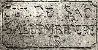 Voir la plaque.