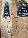Inscriptions indiquant les limites du fief des Coutures-Saint-Gervais.