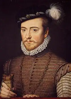 Tableau en buste d'un homme en pourpoint portant un bonnet noir avec une plume blanche.