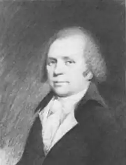 Portrait d'un homme du dix-huitième siècle en noir et blanc, d'âge moyen, en pose trois quarts, regardant l'observateur. Il porte un habit sombre, une chemise blanche et une perruque classique.