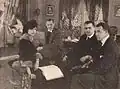 Doris Rankin, Lionel Barrymore, le producteur Whitman Bennett, et le réalisateur Kenneth S. Webb en train de relire le script du film