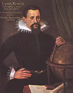 Portrait « de Strasbourg » complété (compas, globe).