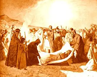 Tableau. Des hommes autour du défunt, qu'ils soulèvent dans un drap.