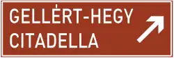 Panneau d'indication d'un lieu touristique complété