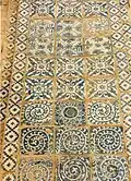 Mausolée d'Abakh Khoja, façade, murs extérieurs en carreaux de céramiques (faïence) aux émaux bleus sur engobe blanc à décors végétaux.