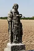 La fontaine proche de la chapelle Saint-Egarec : la statue de saint Hervé.