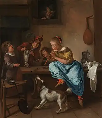 Enfants apprenant à un chat à danser.