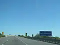 Signalisation de bienvenue sur l'autoroute 404.