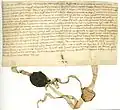 Contrat d’échange entre l’abbaye Saint-Blaise et le baron Ulrich von Klingen au sujet de Beznau et de la colline où se trouve aujourd’hui Klingnau, daté de décembre 1239.