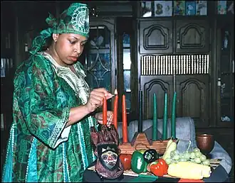 Célébration de Kwanzaa - Allumage de la Kinara.