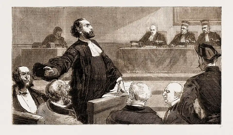 Gravure de presse montrant un avocat plaidant devant la cour et désignant un homme en pointant l'index de sa main droite.