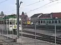 Automotrice Be 4/8 34 Prilly à gauche et Be 4/8 32 Échallens à droite stationnant au dépôt de la gare d'Échallens.