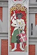 Bas-relief polychrome, à droite de la porte d'entrée, représentant Saint Maurice.