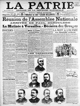 Une en noir et blanc d’un journal comportant les portraits de sept hommes, moustachus et/ou barbus