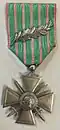 La Croix de guerre 1914-1918 avec palme de bronze décernée à la ville.